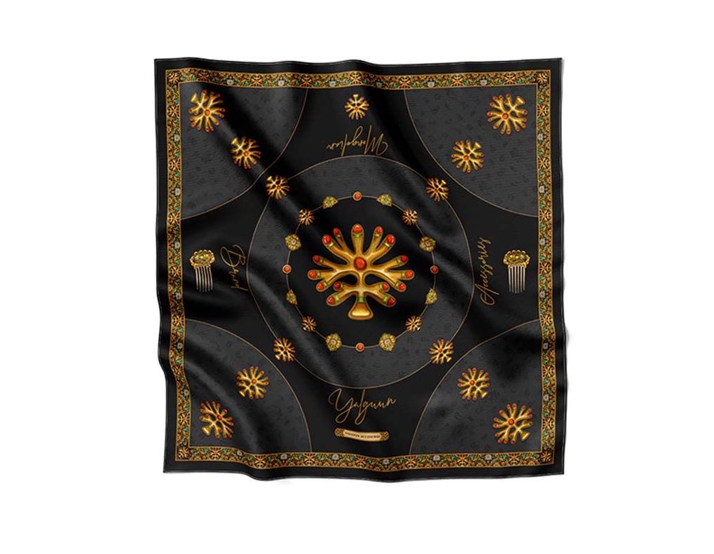 Luxurious black silk scarf adorned with golden traditional motifs, intricate ornaments, and decorative patterns, exuding elegance and sophistication.