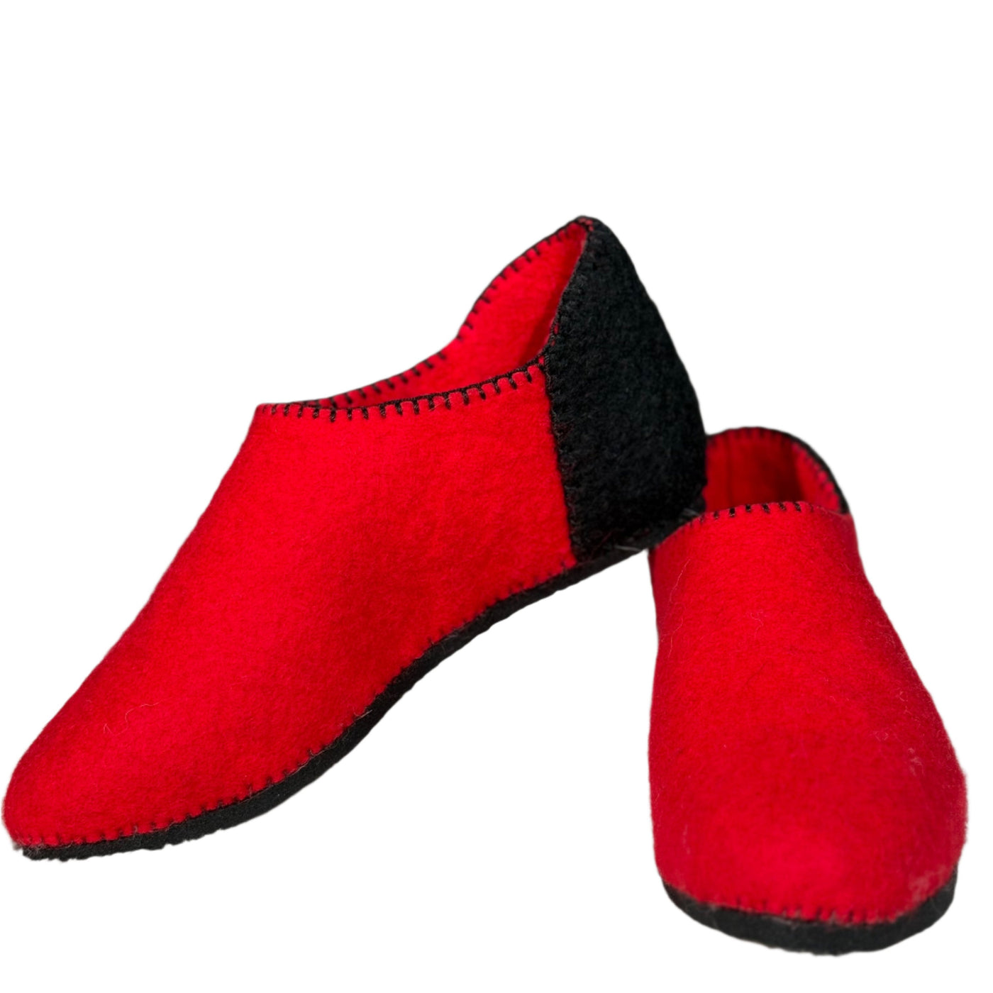 Handmade sustainable felt shoes made from natural wool with a cozy, minimalist design. Ideal for eco-conscious and winter wear.