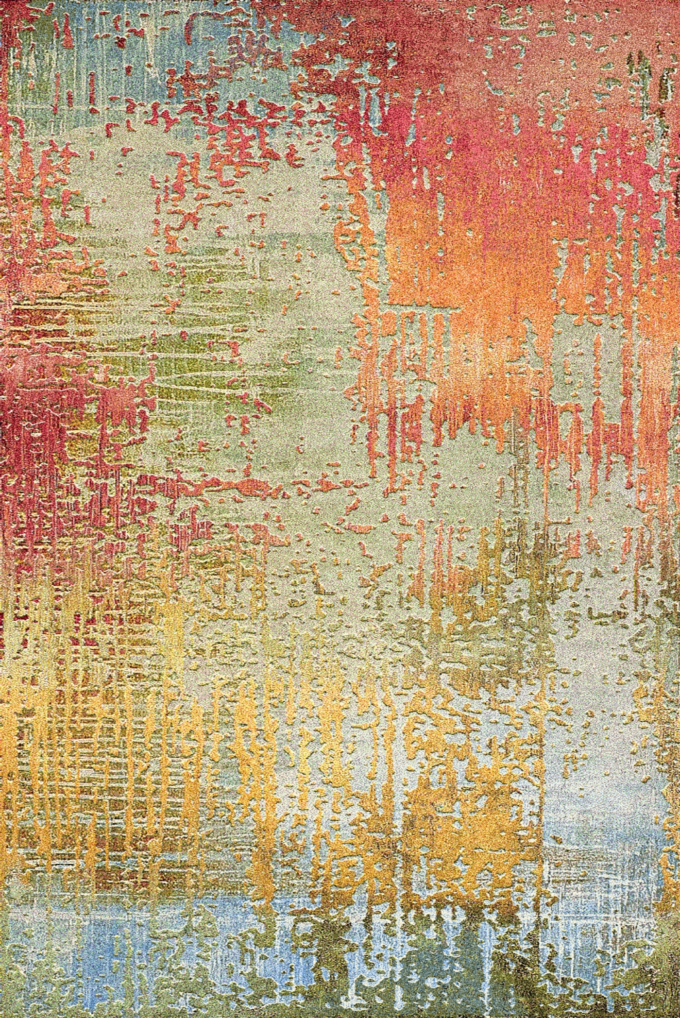 A carpet featuring an abstract design with vibrant colors in shades of red, orange, yellow, green, and blue, set against a textured background.