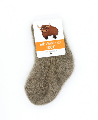 Pure yak wool kids' socks in beige, sustainably made in Mongolia, soft and warm for toddlers and children.